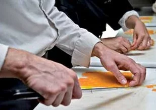 Prendre des cours de cuisine au restaurant En Marge